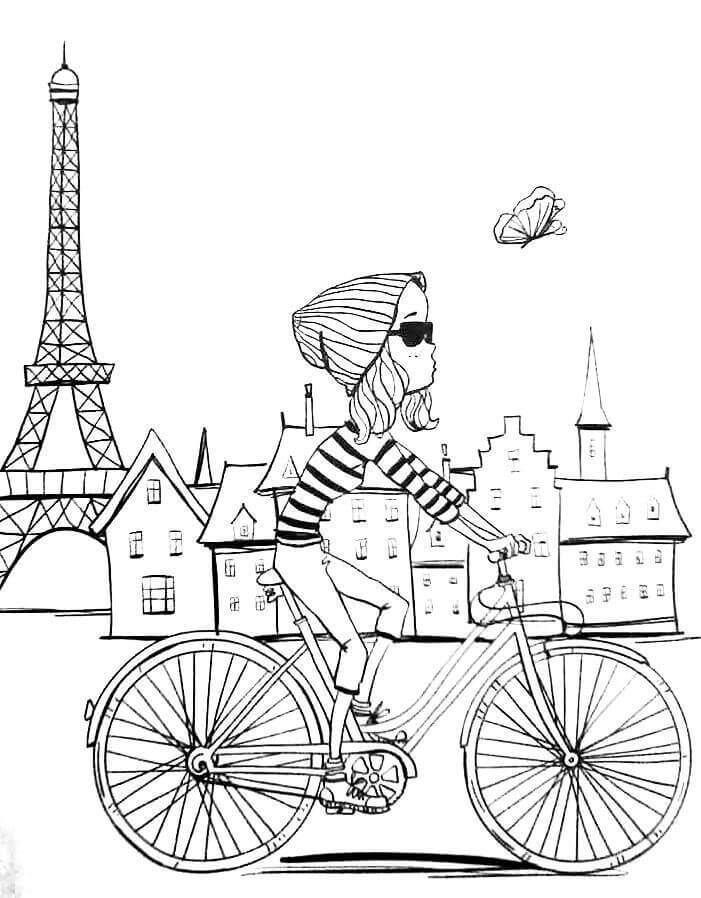Chica en Bicicleta en la Ciudad de Paris