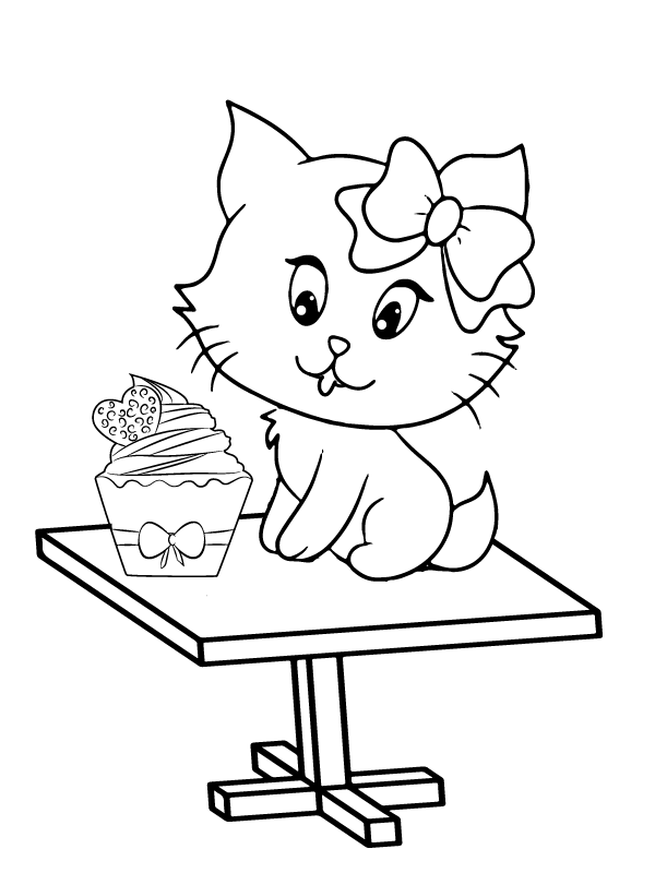 Adorable Kitten and Cupcake on Table