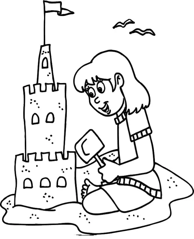 A Girl Building A Sand Castle