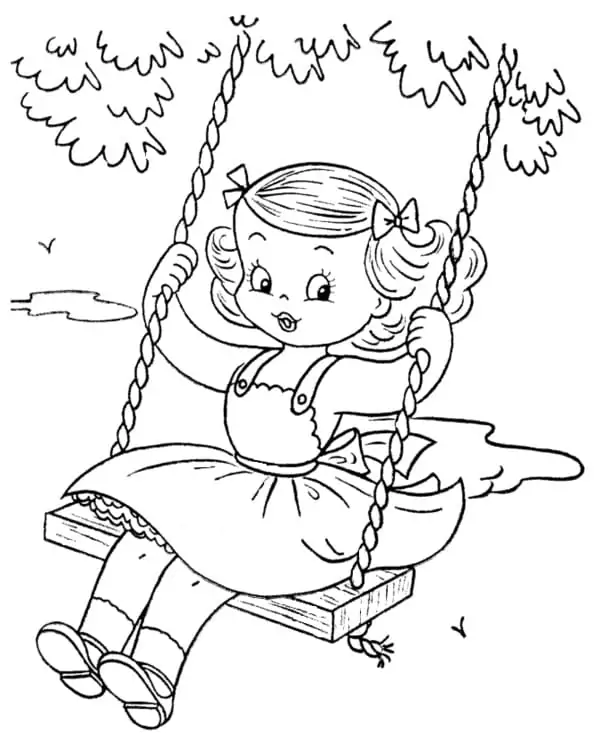 Little Girl Playing On A Swing